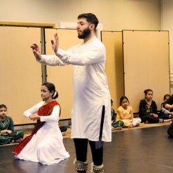 A man taking part in a Kathak Dance class
